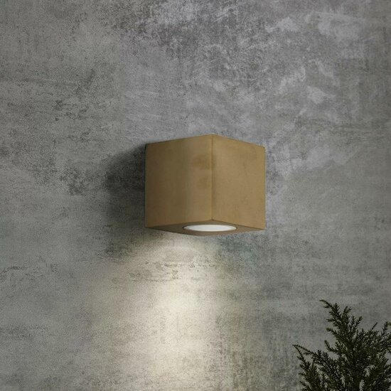 Square brass Levi wall light with downward light beam